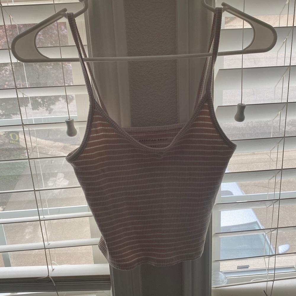 A pink and white striped tank top